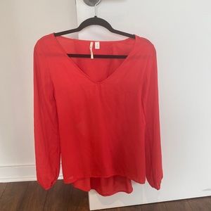 Coral blouse with open back